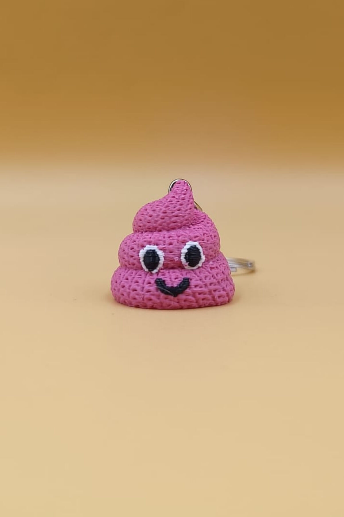 Örgü Desenli Neşeli Kaka Anahtarlık (Plastik) Pembe